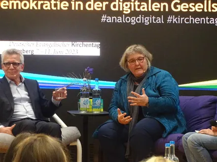 Thomas de Maizière und Heike Springhart im Gespräch